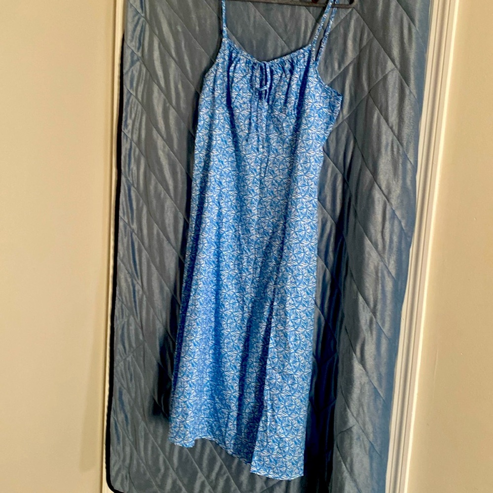 Never worn! Floral sundress, size large with spaghetti straps and zipped back.